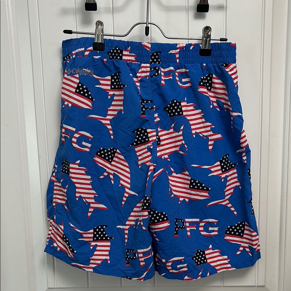 Columbia Athletic Shorts one with a Patriotic Design another is orange